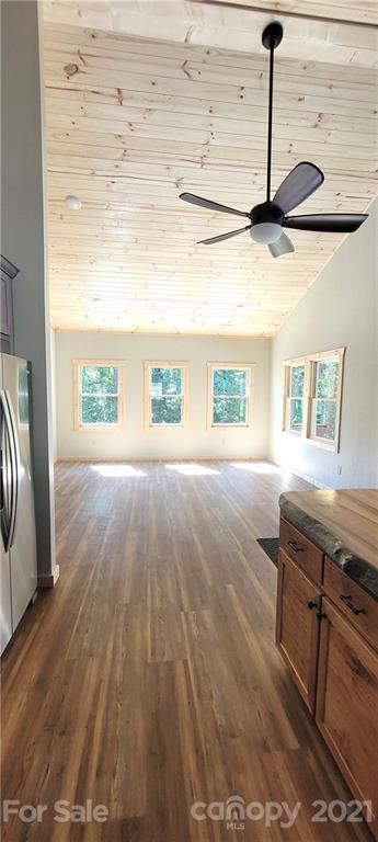 6722 Old Clyde Road Canton, NC 28716 - Photo 13 of 27 a hallway with a wooden floor