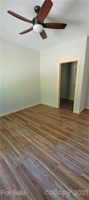6722 Old Clyde Road Canton, NC 28716 - Photo 19 of 27 wooden floor in an empty room