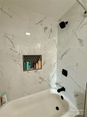 a bathroom with a bathtub