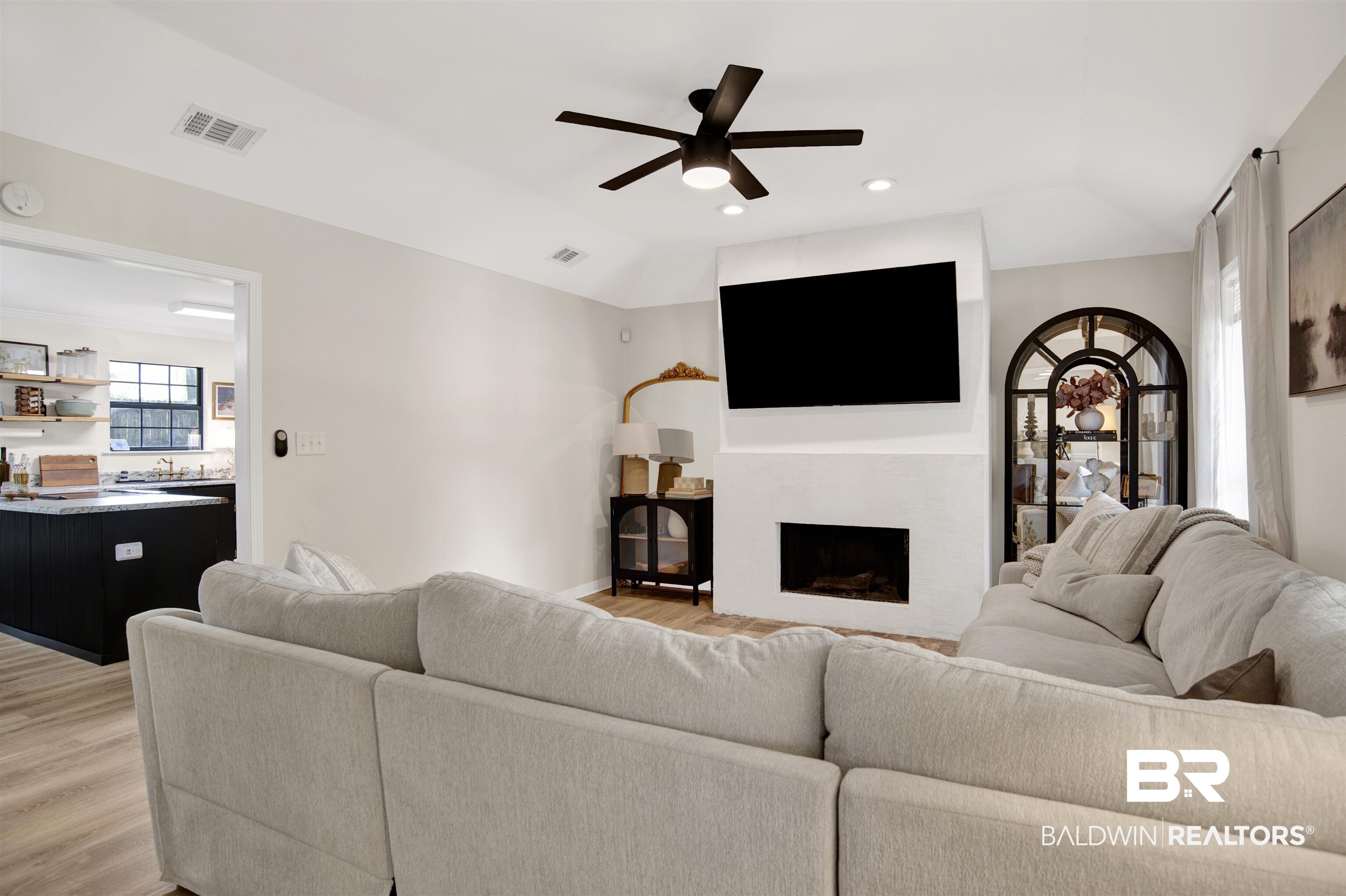 142 Richmond Road Daphne, AL 36526 - Photo 8 of 27 Living room featuring ceiling fan, light wood-type flooring, a fireplace, baseboards, and recessed lighting