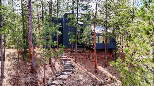 a backyard of a house with lots of green space