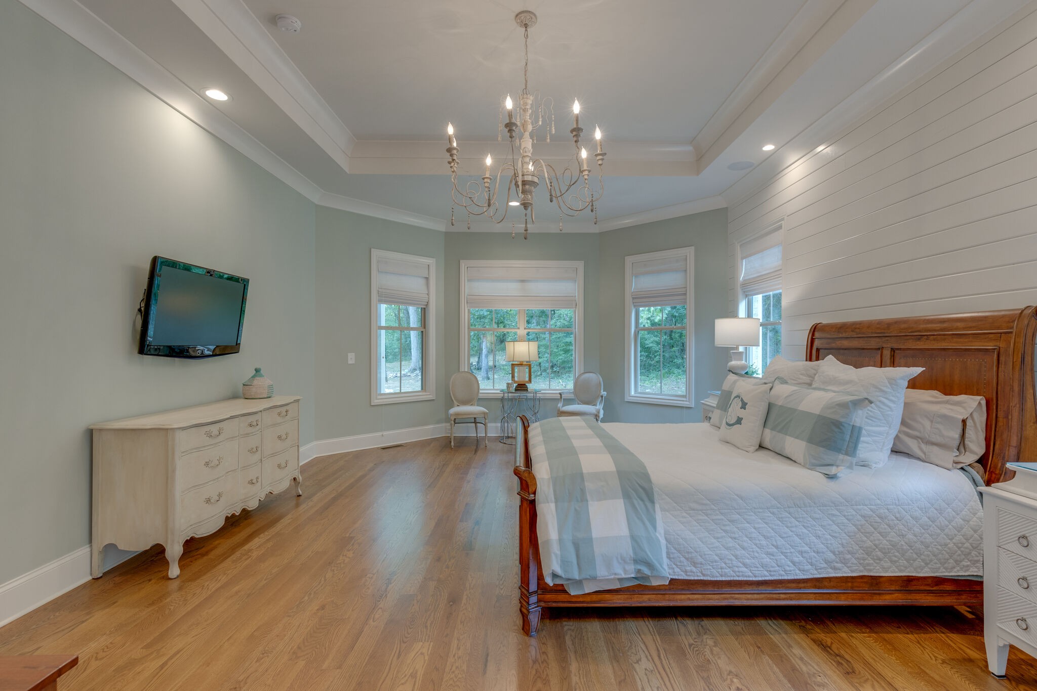 4841 Ollie Chunn Road Spring Hill, TN 37174 - Photo 27 of 69 a spacious bedroom with a large bed and a flat tv screen on dresser