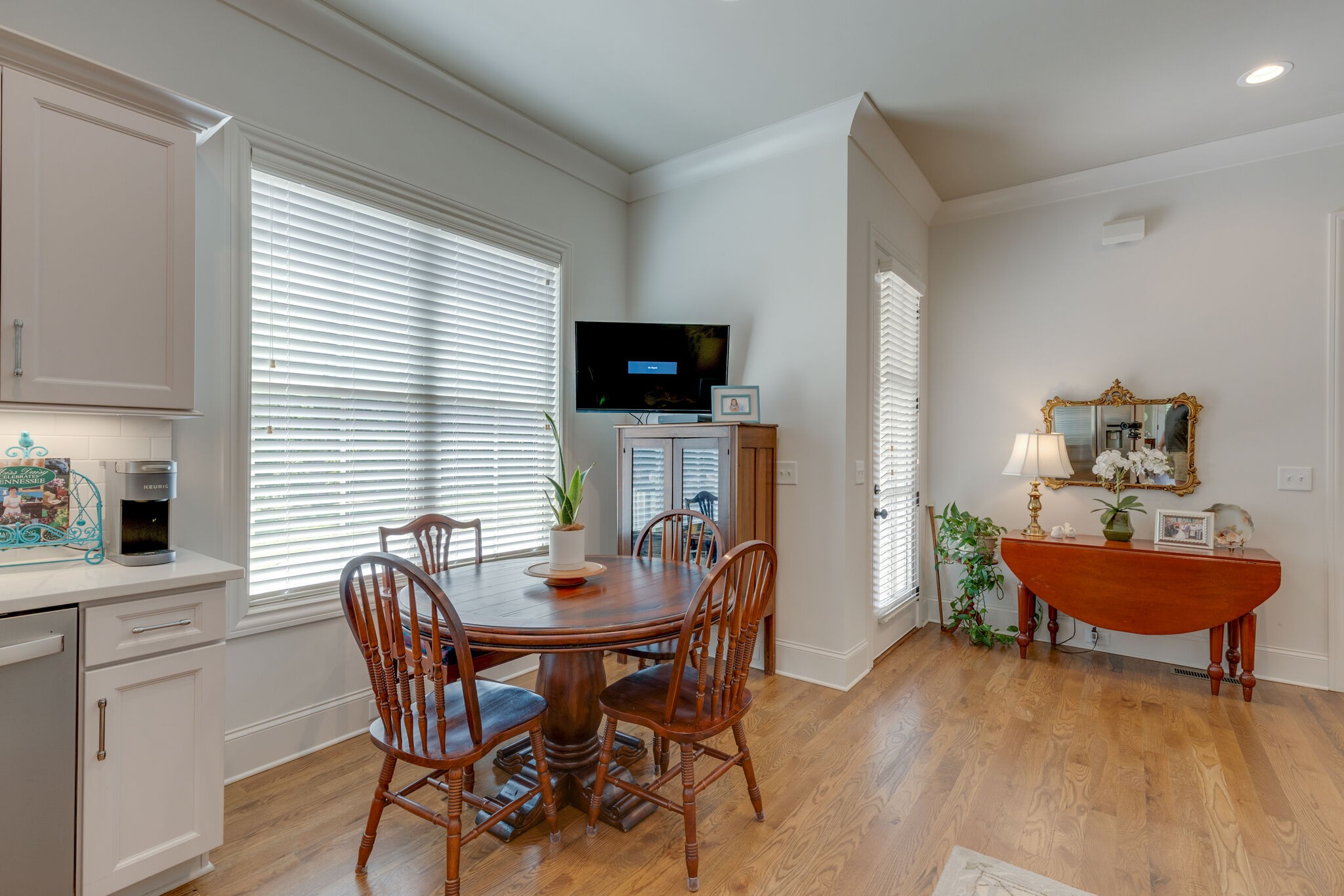 4841 Ollie Chunn Road Spring Hill, TN 37174 - Photo 33 of 69 a view of a dining room with furniture and wooden floor