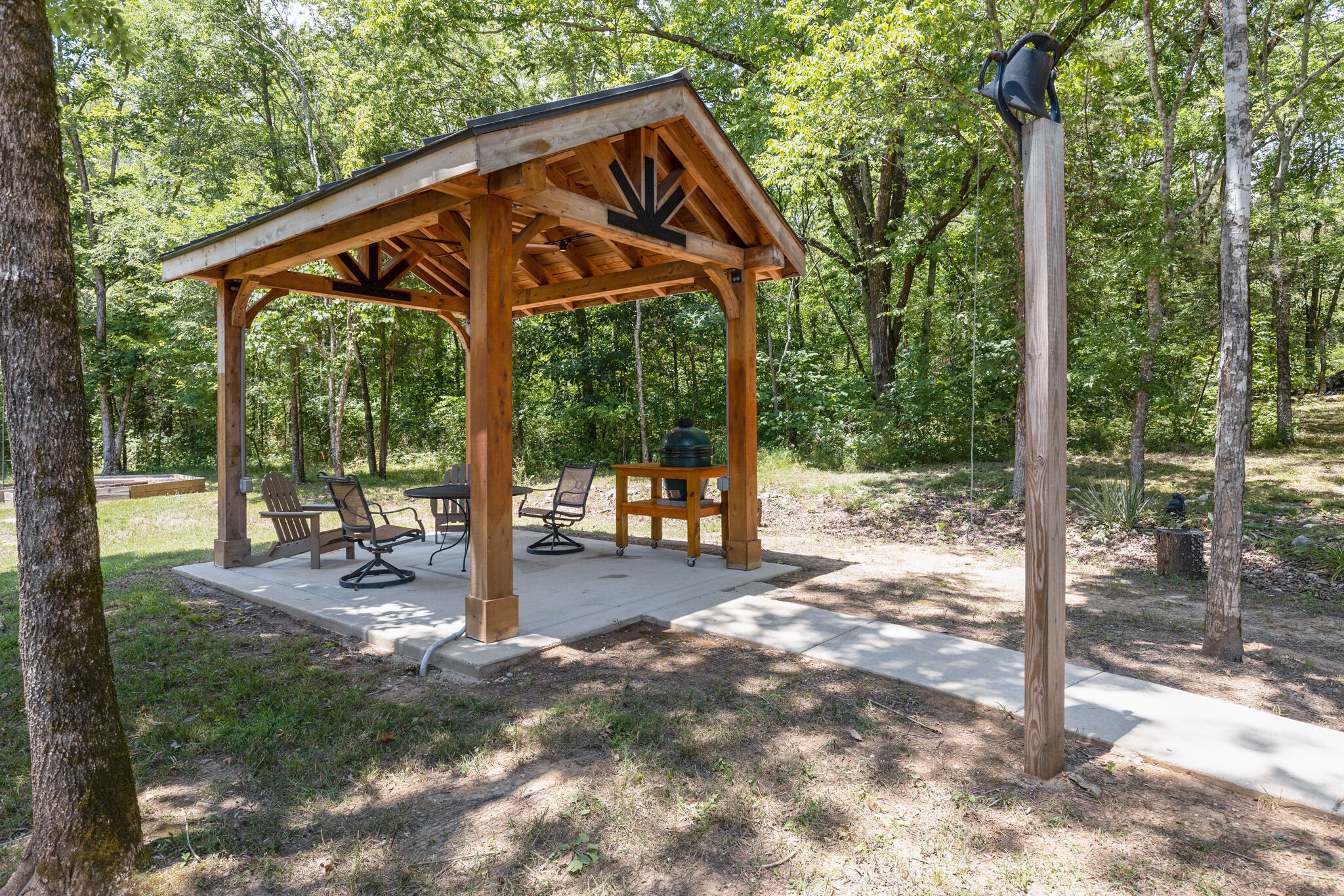 4841 Ollie Chunn Road Spring Hill, TN 37174 - Photo 55 of 69 a view of a patio with a table chairs and a backyard