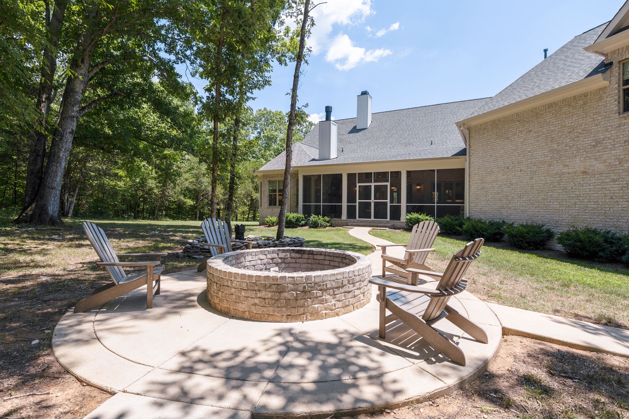 4841 Ollie Chunn Road Spring Hill, TN 37174 - Photo 56 of 69 a view of a house with backyard and sitting area