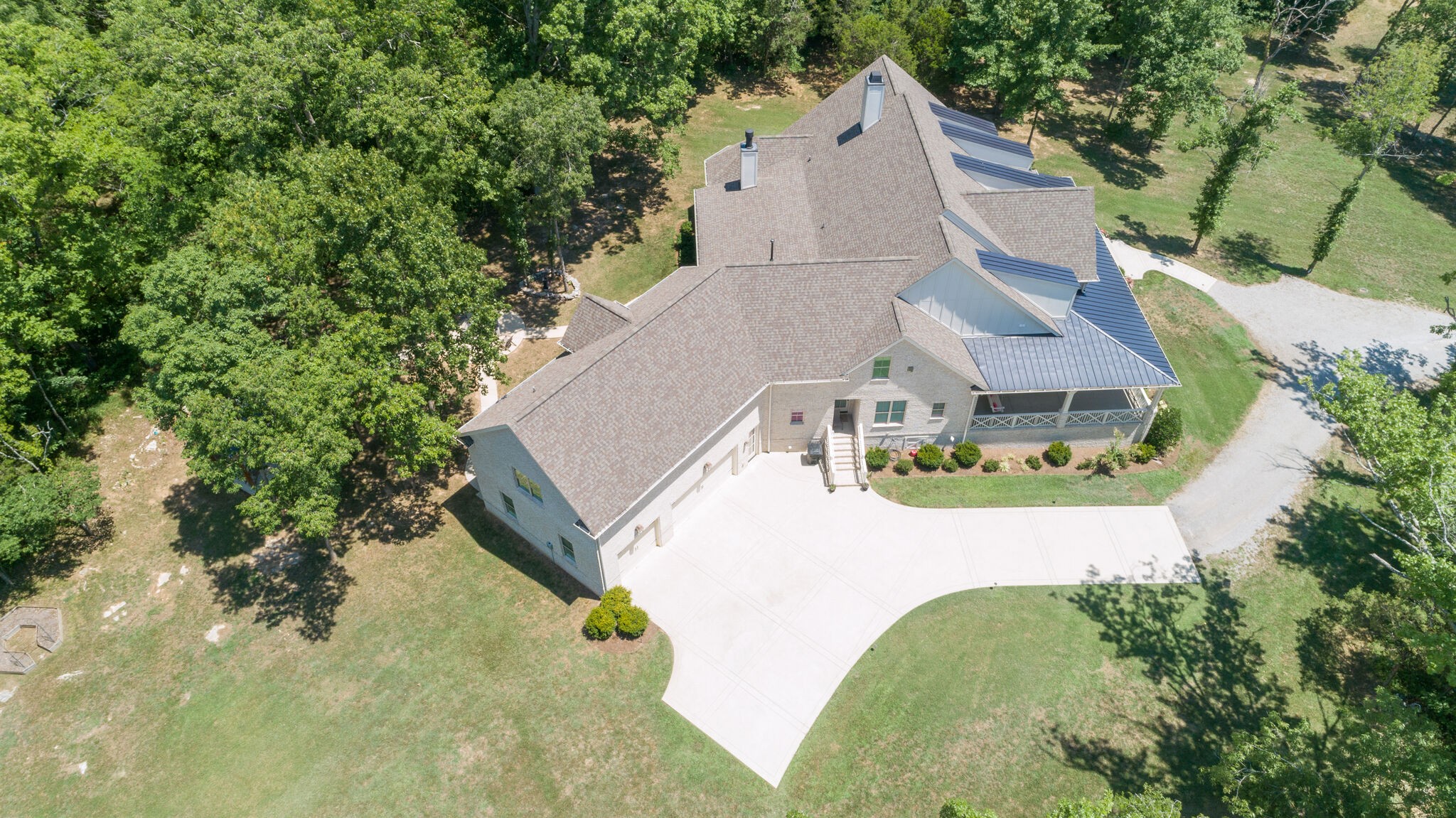 4841 Ollie Chunn Road Spring Hill, TN 37174 - Photo 58 of 69 an aerial view of house with yard and swimming pool