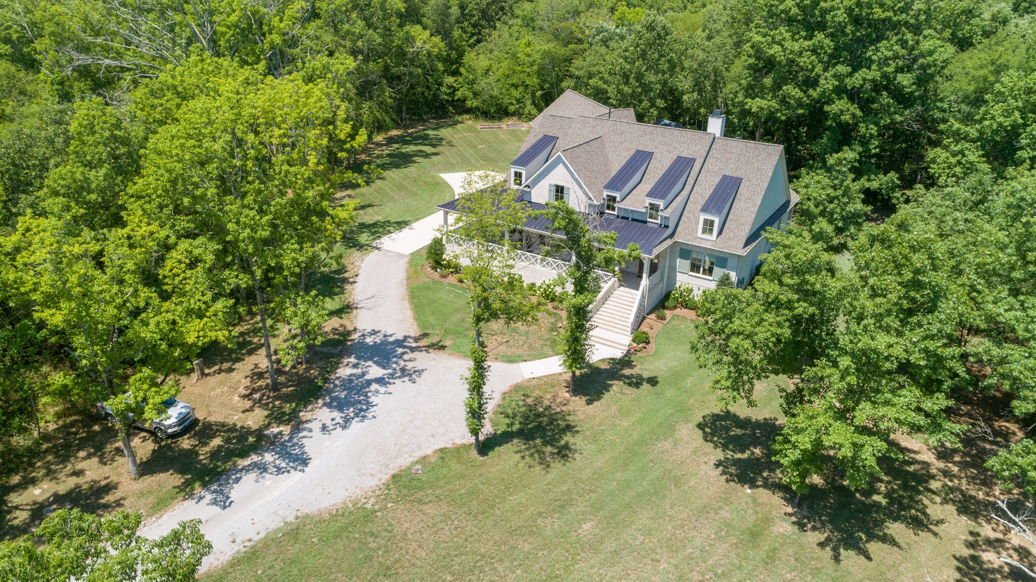 4841 Ollie Chunn Road Spring Hill, TN 37174 - Photo 61 of 69 an aerial view of a house with a yard and swimming pool