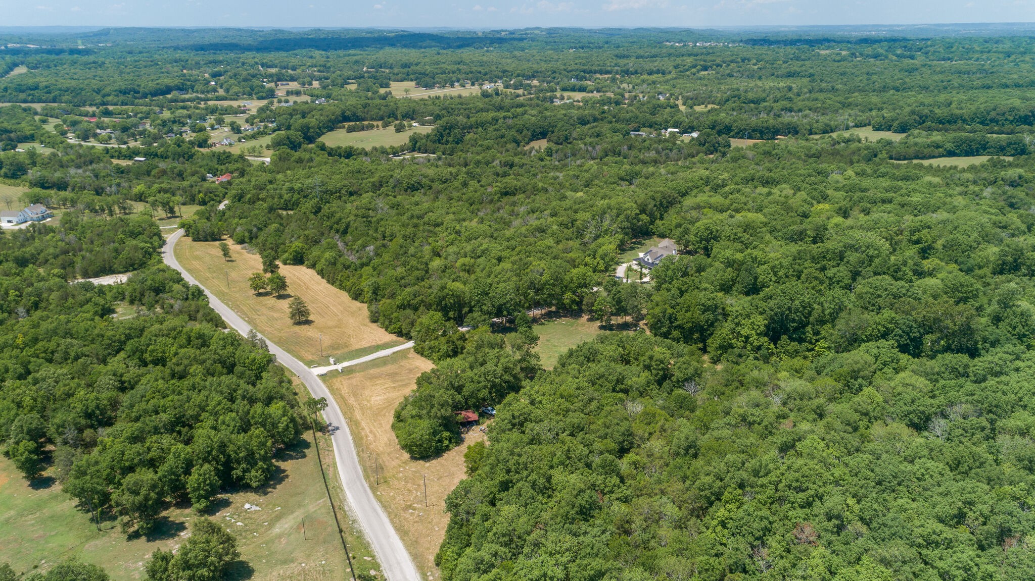 4841 Ollie Chunn Road Spring Hill, TN 37174 - Photo 64 of 69 an aerial view of a house with a yard