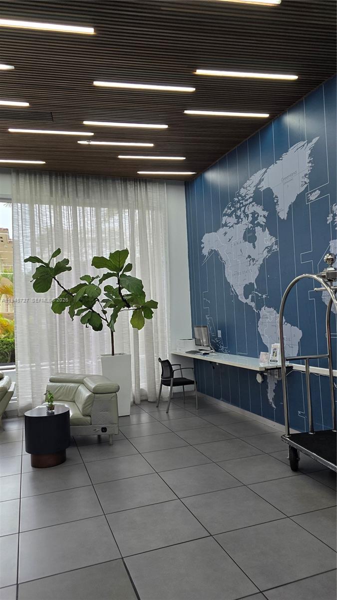 2602 East Hallandale Beach Boulevard, Unit R2810 Hallandale Beach, FL 33009 - Photo 31 of 31 a glass vase with flowers on a table