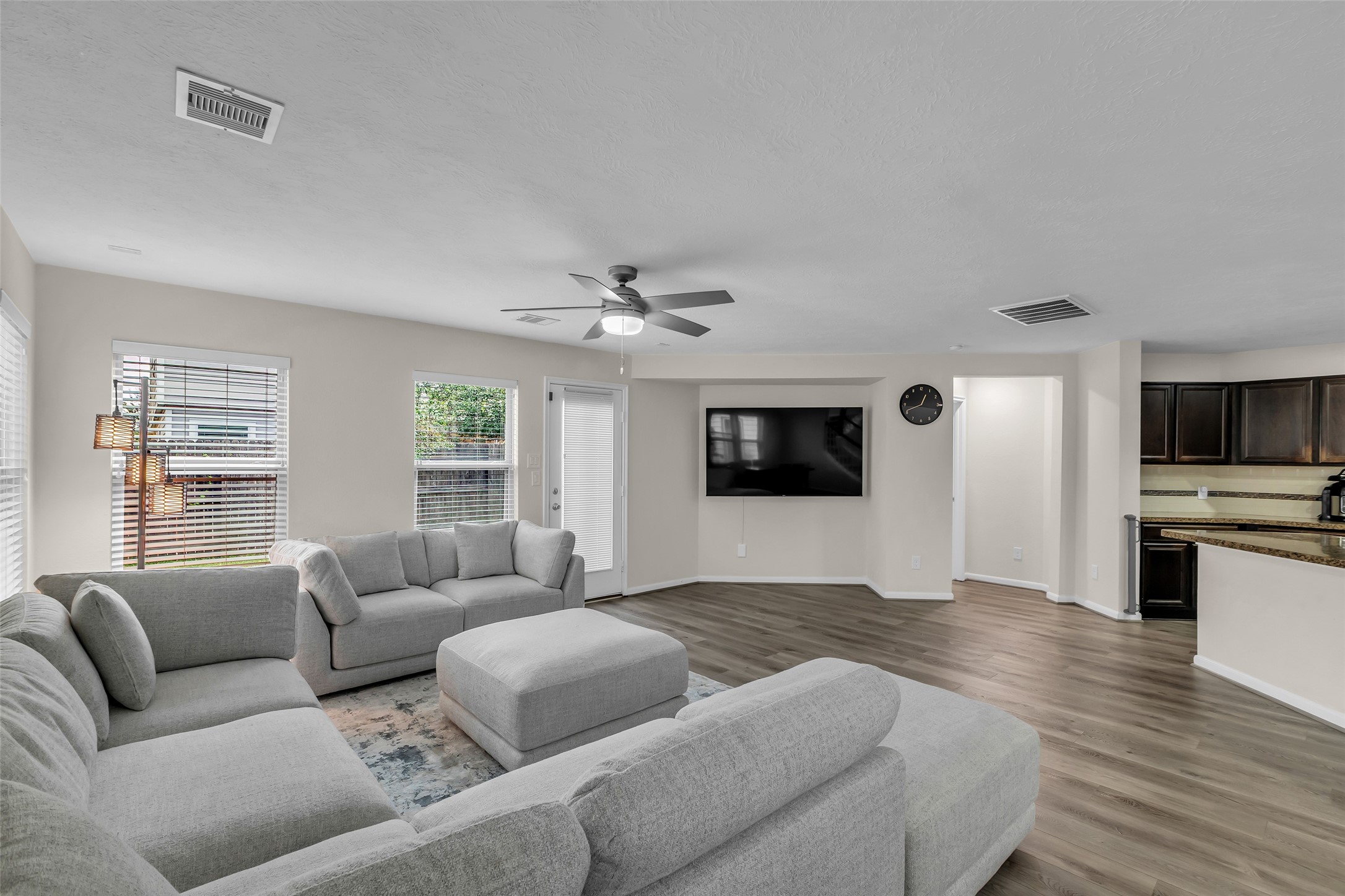 12626 Mint Field Houston, TX 77066 - Photo 12 of 26 a living room with furniture and a flat screen tv