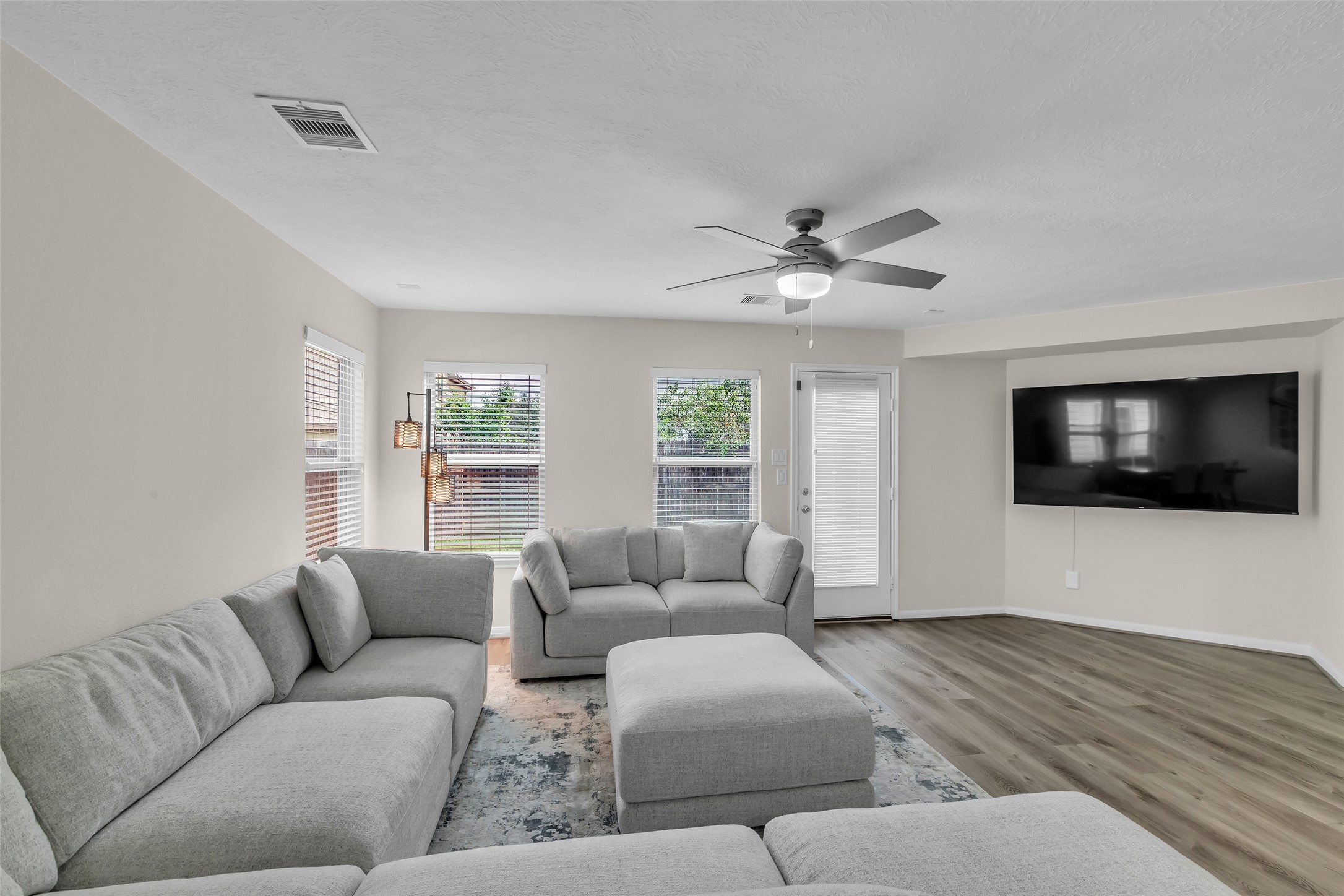 12626 Mint Field Houston, TX 77066 - Photo 13 of 26 a living room with furniture and a flat screen tv