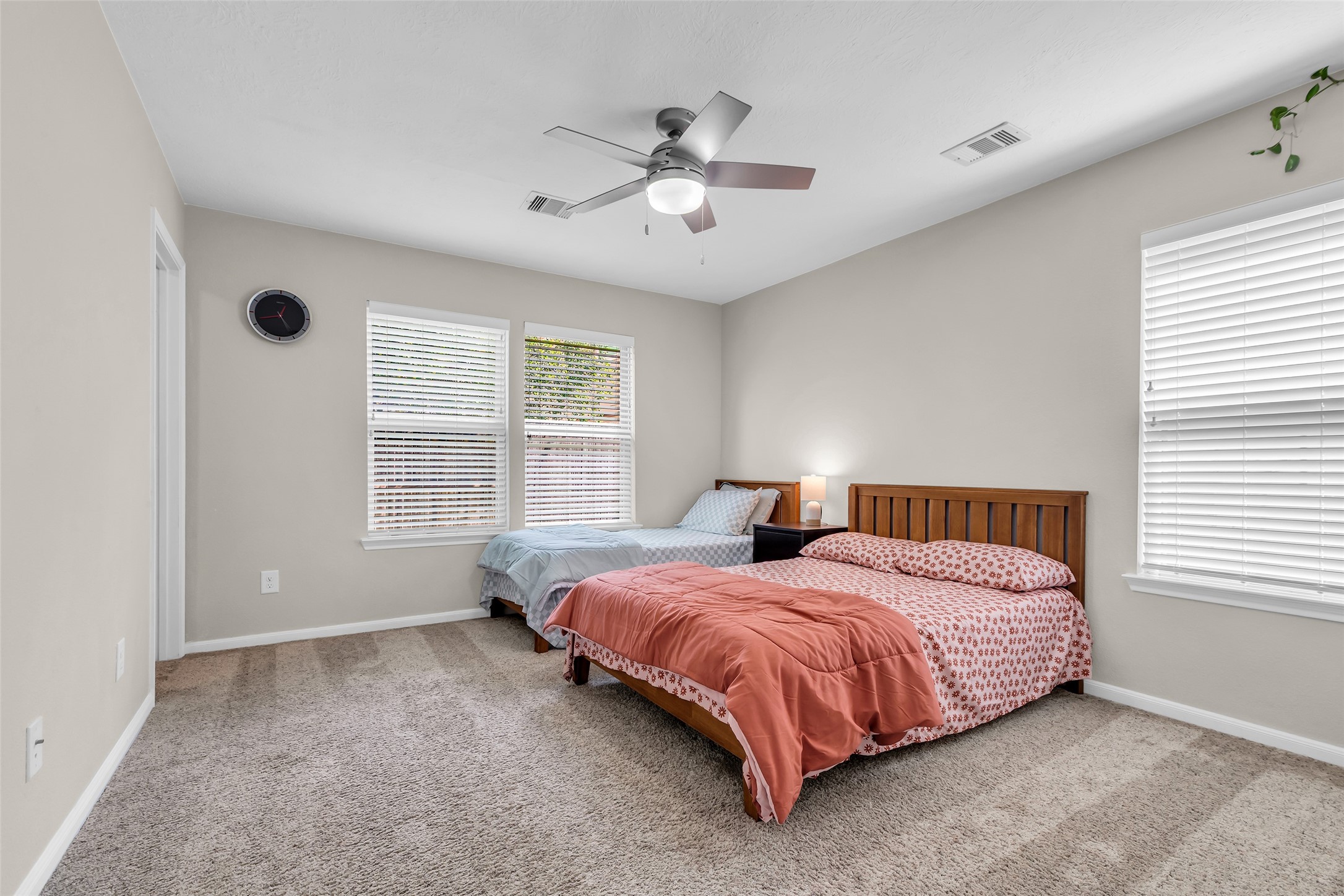 12626 Mint Field Houston, TX 77066 - Photo 15 of 26 a bedroom with a bed and window