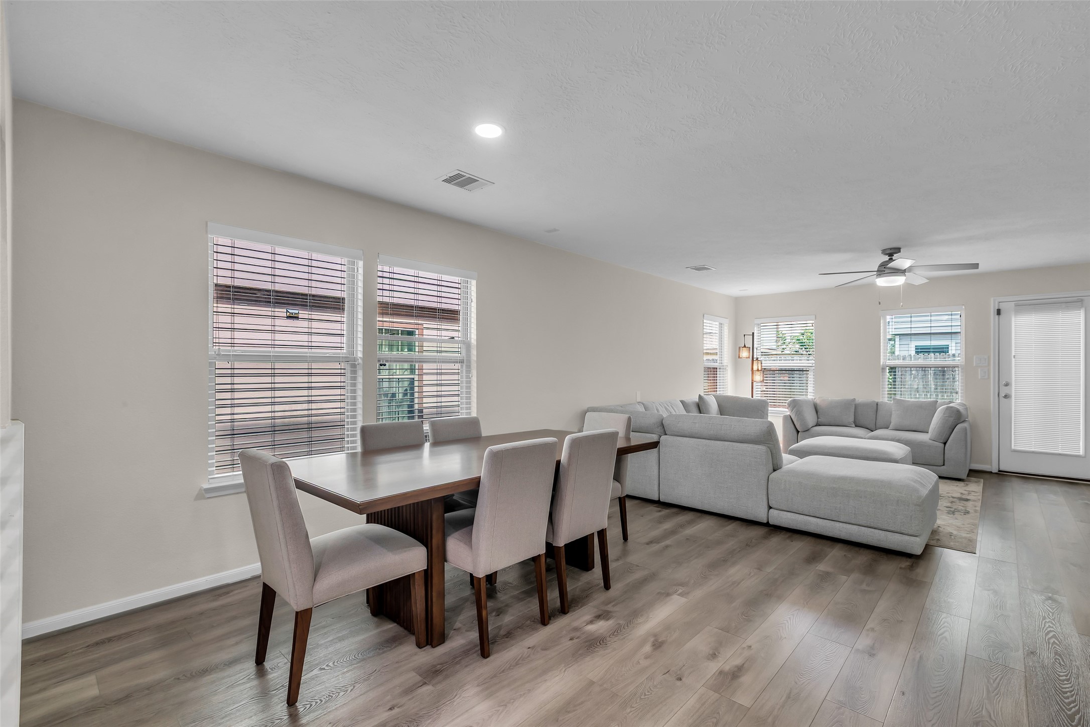 12626 Mint Field Houston, TX 77066 - Photo 9 of 26 a living room with furniture and a wooden floor