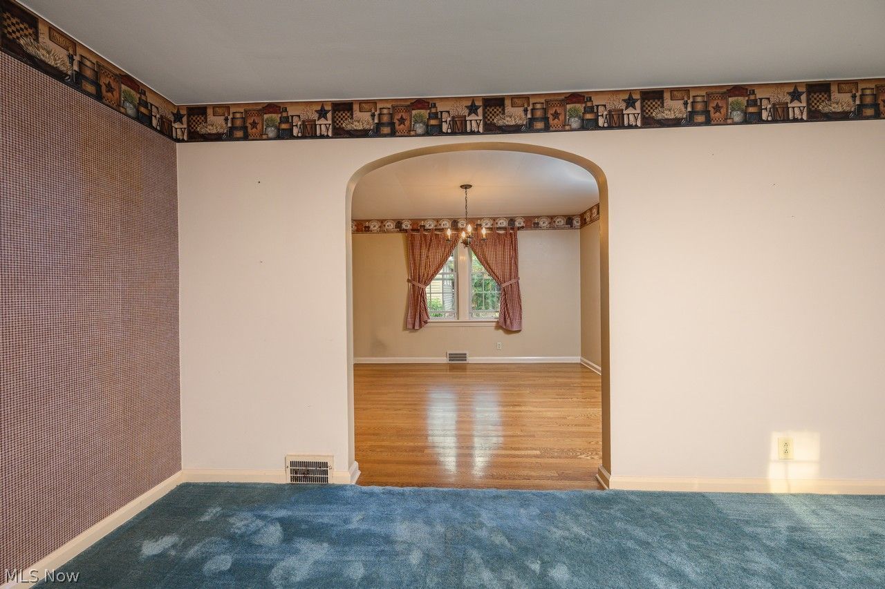 1422 Monument Road Northwest Canton, OH 44703 - Photo 9 of 31 Curved archway to dining room
