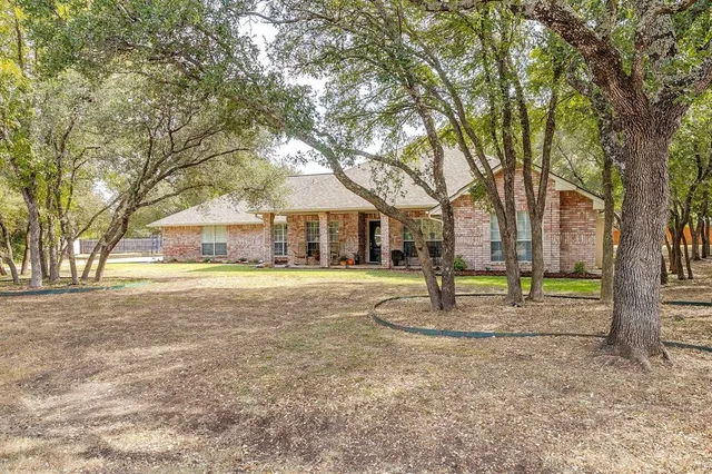 a view of house with outdoor space and street view