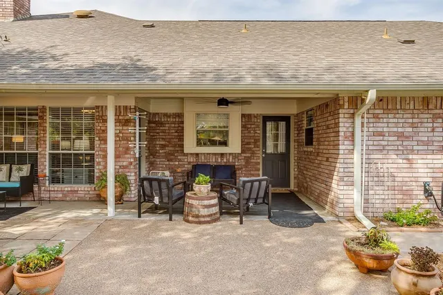 a view of a swimming pool with a yard