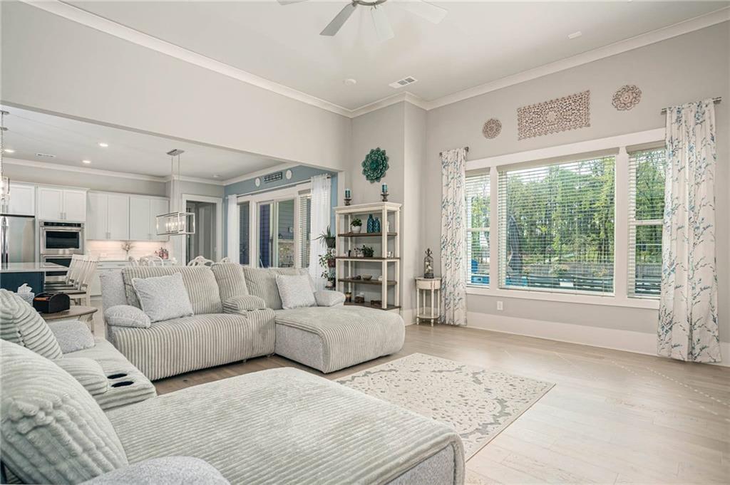 255 Old Town Road Dacula, GA 30019 - Photo 12 of 38 a living room with furniture and large window