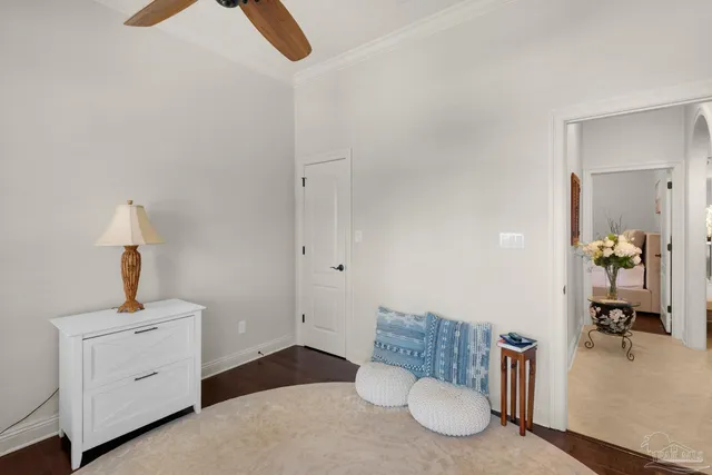 a bedroom with a bed and a table