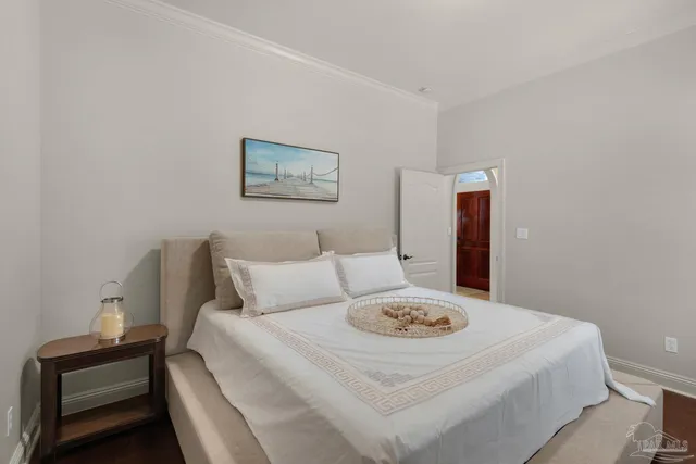 a view of a storage and utility room with washer and dryer