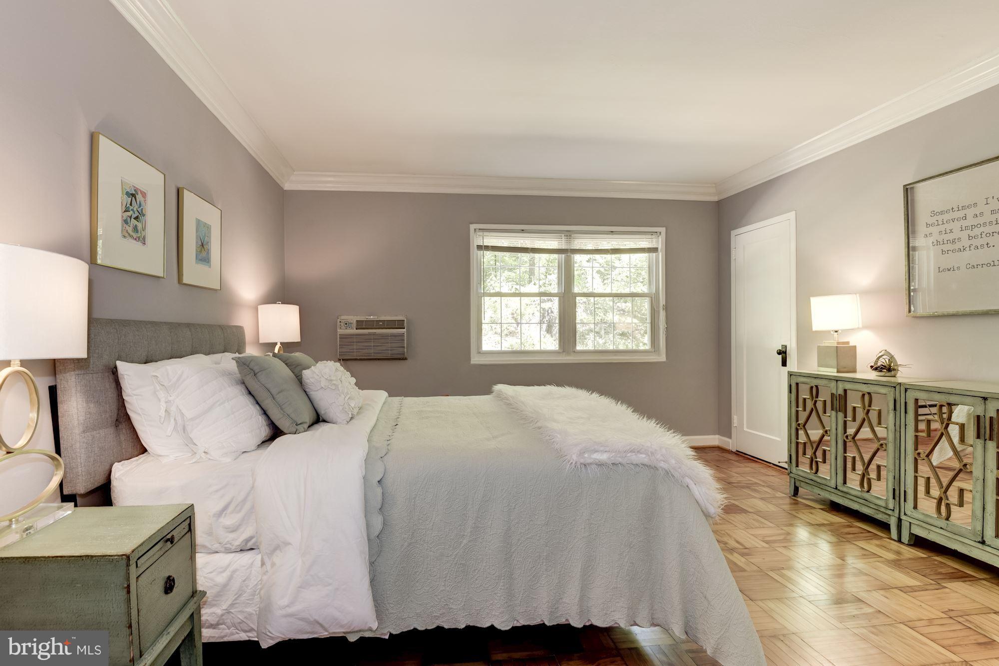 1659 Preston Road Alexandria, VA 22302 - Photo 13 of 26 a bedroom with a large bed and a window