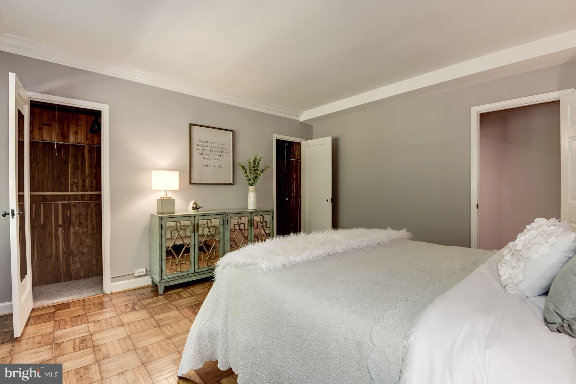 1659 Preston Road Alexandria, VA 22302 - Photo 14 of 26 a bedroom with a bed and a stove top oven