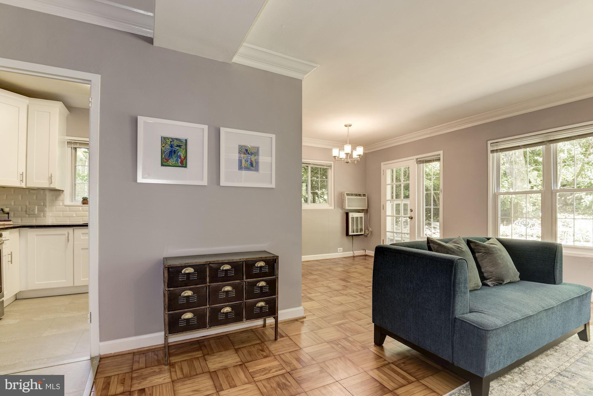 1659 Preston Road Alexandria, VA 22302 - Photo 5 of 26 a living room with furniture and a large window