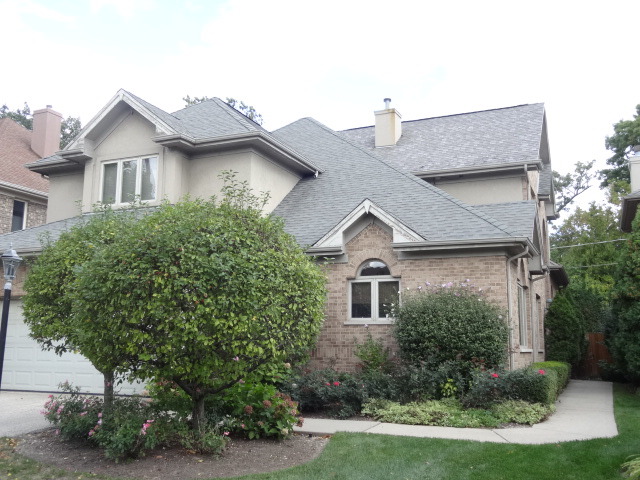8 Ridge Road Highland Park, IL 60035 - Photo 1 of 20 a front view of a house with a yard