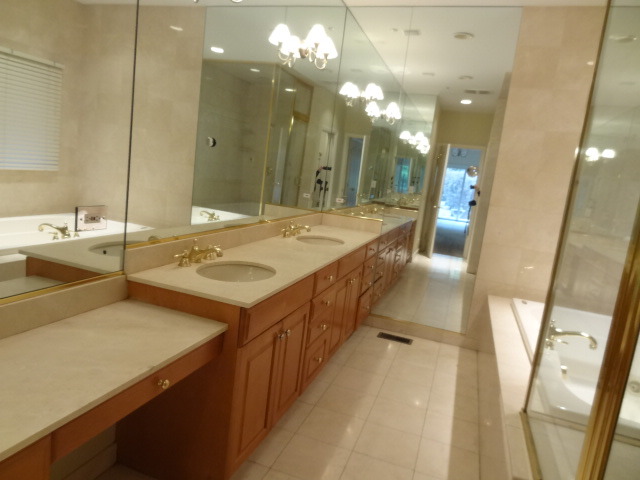 8 Ridge Road Highland Park, IL 60035 - Photo 11 of 20 a bathroom with a sink vanity and a mirror