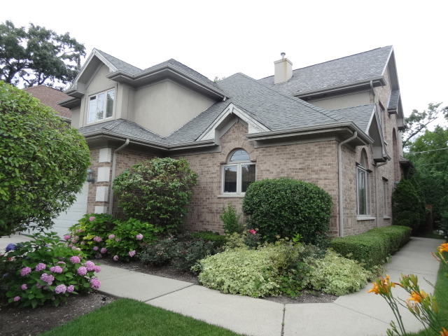 8 Ridge Road Highland Park, IL 60035 - Photo 19 of 20 a front view of a house with a yard