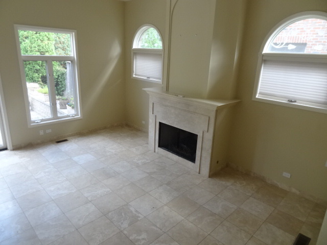 8 Ridge Road Highland Park, IL 60035 - Photo 5 of 20 an empty room with windows