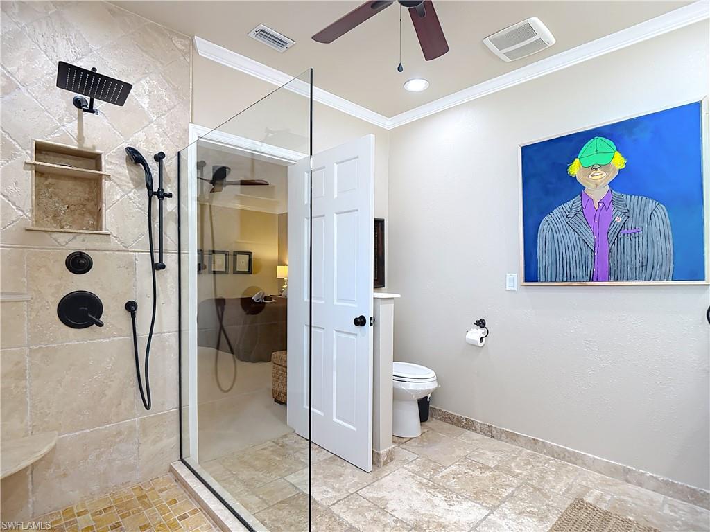 106 Siena Way, Unit 1508 Naples, FL 34119 - Photo 29 of 47 a bathroom with a toilet and a shower