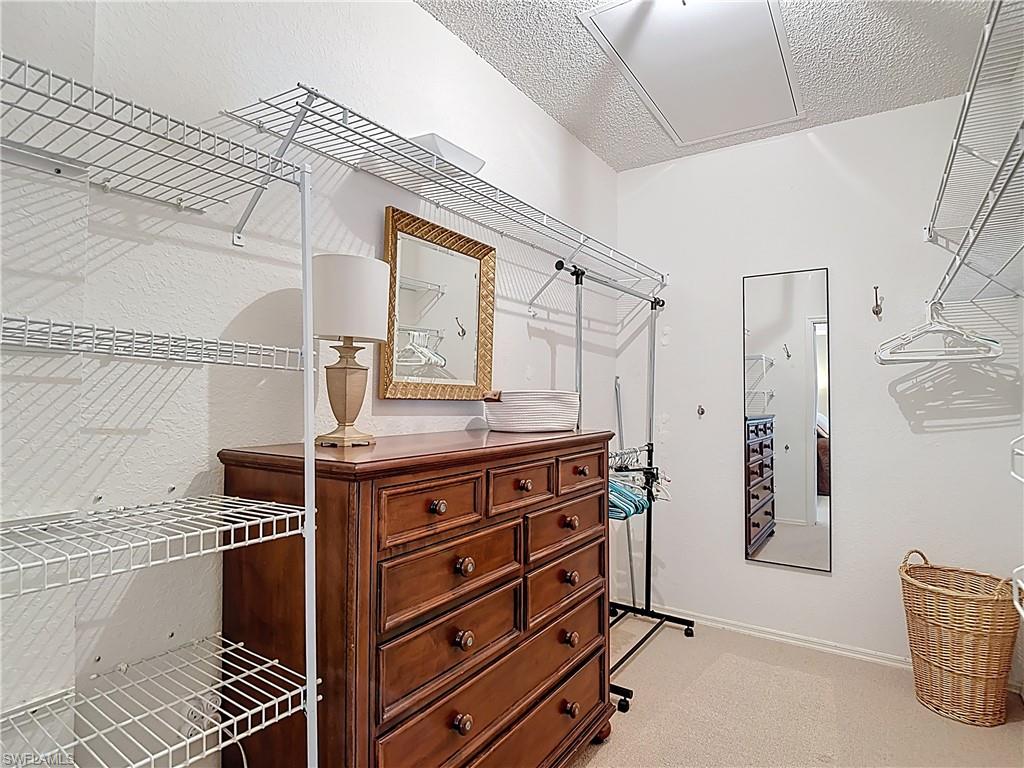 106 Siena Way, Unit 1508 Naples, FL 34119 - Photo 30 of 47 a view of storage and utility room