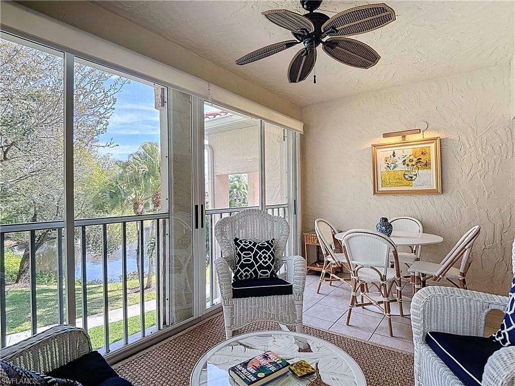 106 Siena Way, Unit 1508 Naples, FL 34119 - Photo 43 of 47 a bedroom with furniture and windows