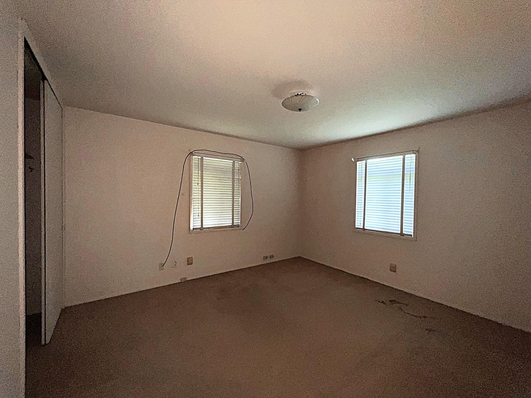 535 Fleda Road Memphis, TN 38120 - Photo 11 of 14 an empty room with a window