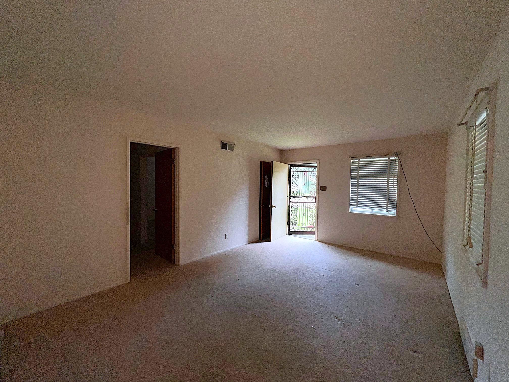 535 Fleda Road Memphis, TN 38120 - Photo 4 of 14 a view of empty room with windows