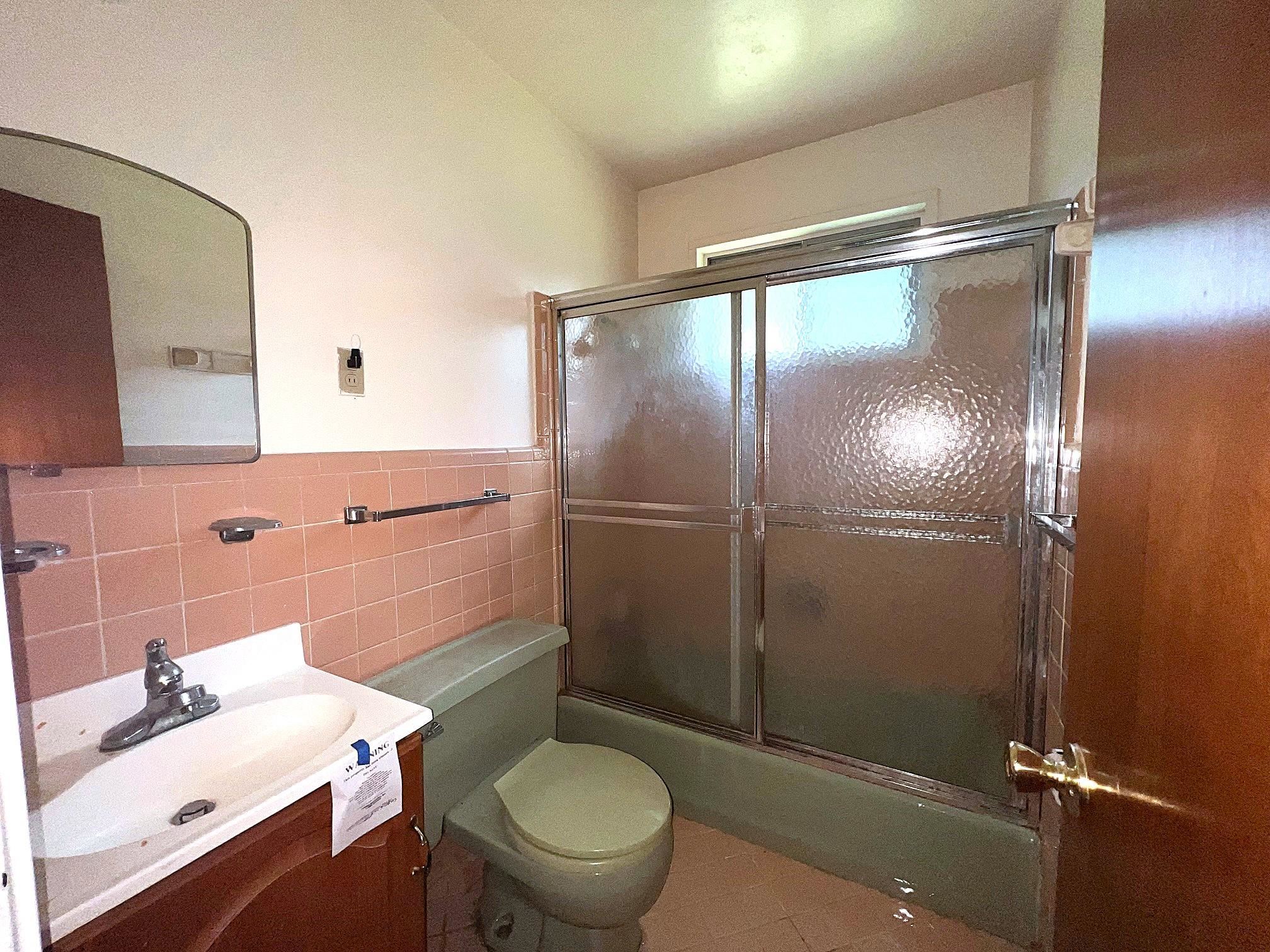 535 Fleda Road Memphis, TN 38120 - Photo 8 of 14 a bathroom with a sink toilet and shower