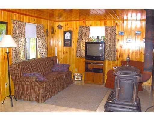 248 West Shore (side) Road Stacyville, ME 04777 - Photo 6 of 12 Living Room.