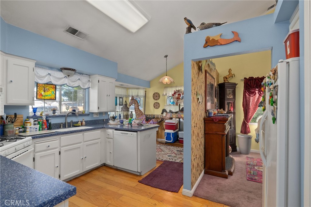 23 Carriage Lane Chico, CA 95926 - Photo 18 of 41 a kitchen with a sink and cabinets