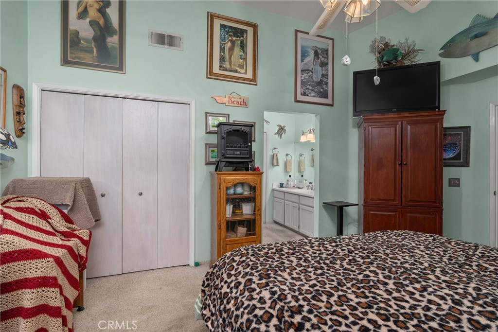 23 Carriage Lane Chico, CA 95926 - Photo 31 of 41 a bedroom with a bed and a television