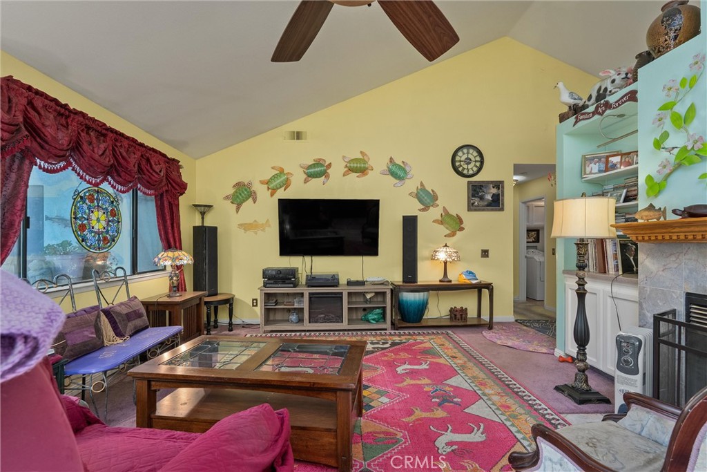 23 Carriage Lane Chico, CA 95926 - Photo 10 of 41 a living room with furniture and a flat screen tv