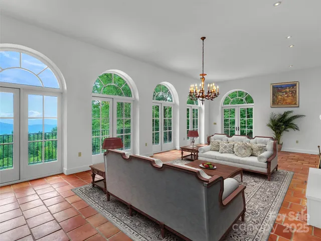 a view of a room with windows