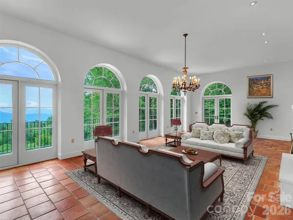 a view of a room with windows