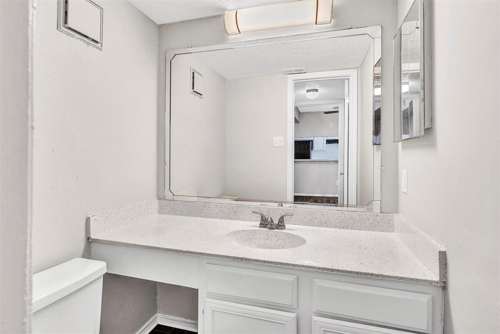 11311 Audelia Road, Unit 216 Dallas, TX 75243 - Photo 13 of 15 1/2 bath downstairs