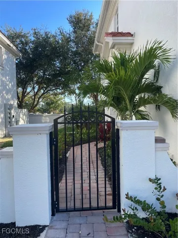a flower plants in front of a house