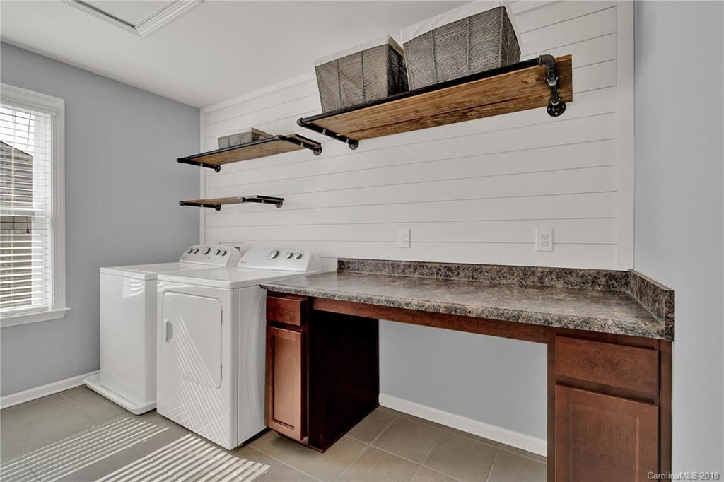2269 Bluebell Way Tega Cay, SC 29708 - Photo 22 of 31 a utility room with cabinets