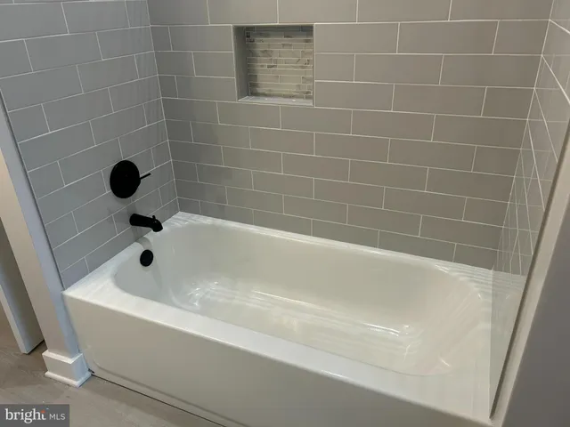 a bathroom with a bathtub