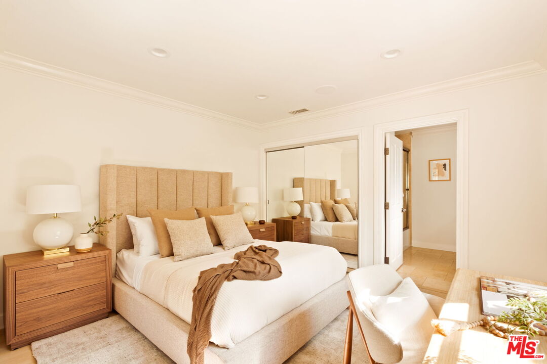 1132 Chantilly Road Los Angeles, CA 90077 - Photo 13 of 22 a bedroom with a bed and lamp
