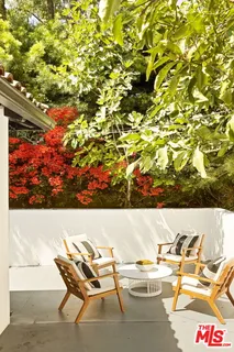 a view of swimming pool with lounge chair