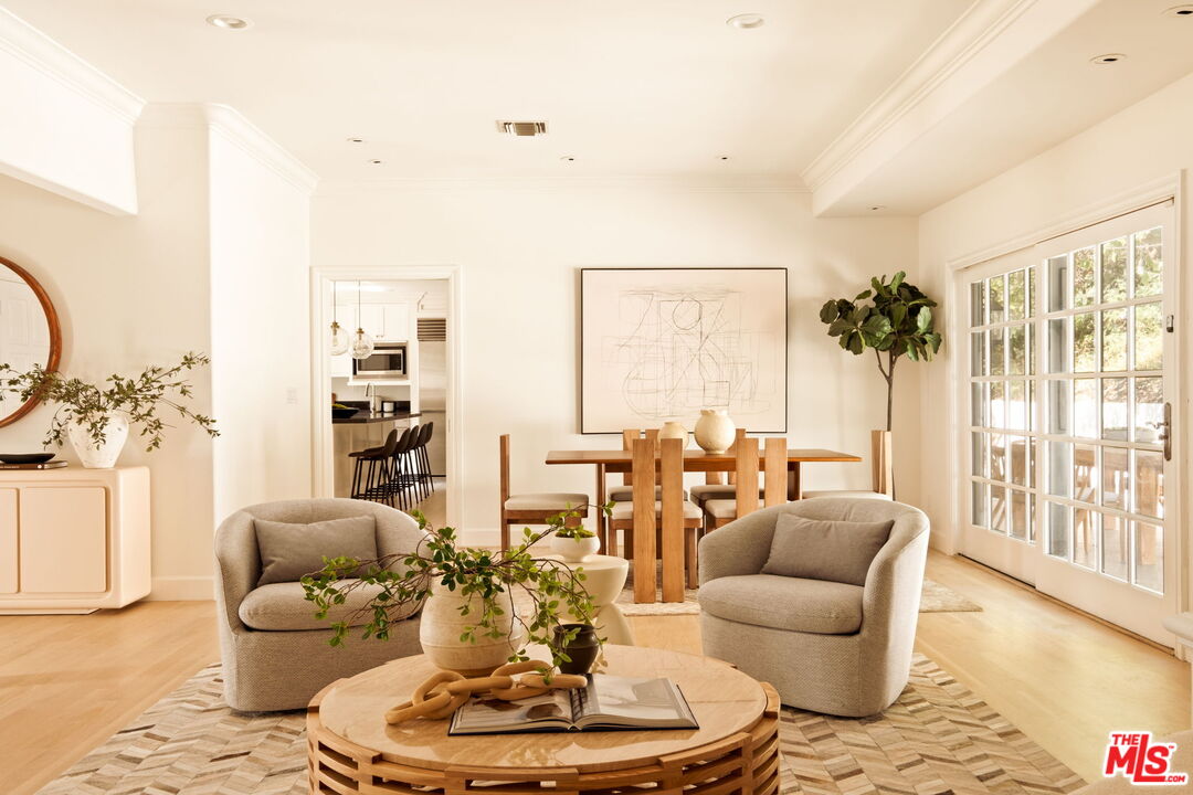 1132 Chantilly Road Los Angeles, CA 90077 - Photo 2 of 22 a living room with furniture and a large window