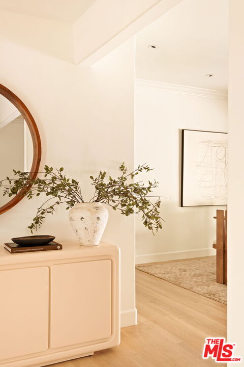 1132 Chantilly Road Los Angeles, CA 90077 - Photo 5 of 22 a bathroom with a sink and a mirror